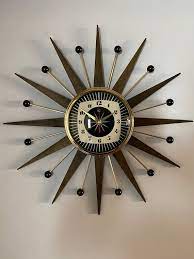 Goldtone Starburst Clock