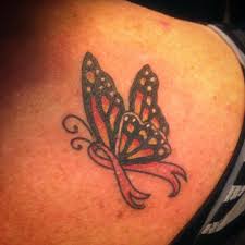 Breast cancer ribbon roses tattoo with a flying dragonfly. Dainty Little Butterfly And Breast Cancer Ribbon Tried And True Tattoo