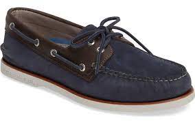 blue and brown laced men s boat shoes