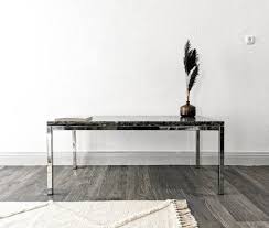 mid century coffee table in chrome and