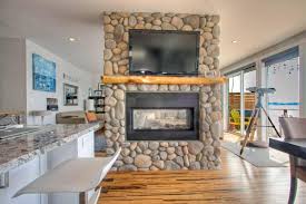 River Rock Fireplace In Sound View Home