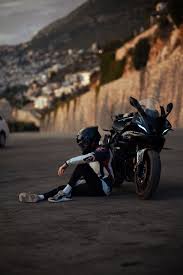 biker sitting by motorcycle free
