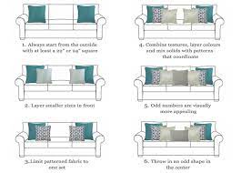 arranging cushions on a sofa uk