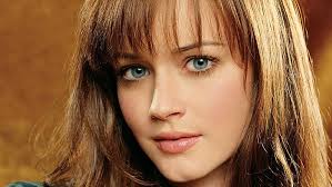 closeup brunette actress blue eyes
