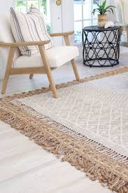 tips to layering neutral rugs beach