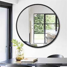 medium round black hooks modern mirror