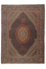 a fine persian tabriz mahi carpet