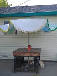 If you are going to paint a light color, i'd recommend using a light colored canvas. How To Diy A Patio Umbrella Cover Little Vintage Cottage