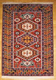 a kuba rug with ancient egyptian and