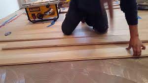 gluing wood floors to concrete you