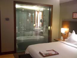 The Glass Wall Between Bathroom And Romantic Bedroom With