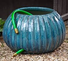 terra cotta ribbed garden hose pot