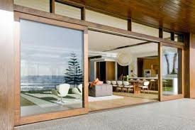 large sliding glass doors with wooden