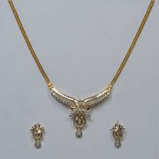 golden designer gold necklace set at
