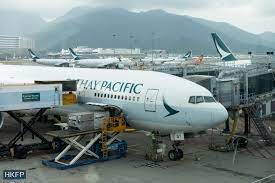 cathay pacific reports first profit