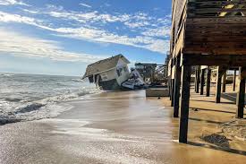 house collapses into ocean and ters