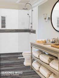 I have the lifeproof vinyl flooring in two rentals, kitchen and bath areas and it is holding up very well. Zero Threshold With Lifeproof Flooring Shower American Bath Factory