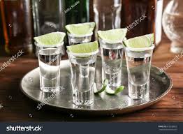 Tequila Shots With Juicy Lime Slices