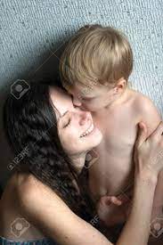 Boy Kisses His Young Mother. Mom Smiles And Laughs. Stock Photo, Picture  and Royalty Free Image. Image 48843981.