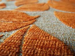 better nylon or polyester carpet
