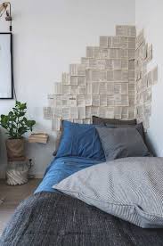 vintage book papers wall decor idea