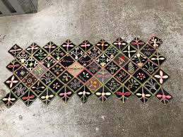 antique and vine penny rugs