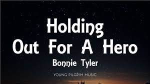 Bonnie Tyler - Holding Out For A Hero (Lyrics) - YouTube