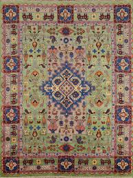 green geometric kazak indian area rug