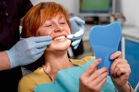 fixed dental implant bridges vs snap