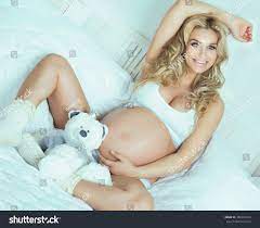 Beautiful Young Blonde Pregnant Woman Lying Stock Photo 380389564 |  Shutterstock