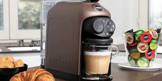 Resultado de imagem para Lavazza Deséa: the coffee machine that froths milk straight into your mug