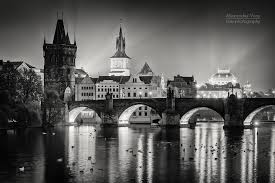 They combine black and white in a continuum producing a range of shades of gray. Black And White Photography Prague Charles Bridge Alexander Voss Fine Art Fotografie Digital Analog