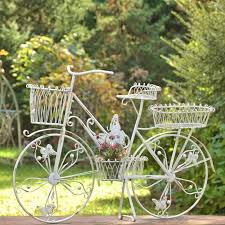white erfly bicycle plant stand