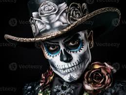 man in day of the dead makeup with