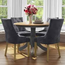 Can accommodate more people with extenders. Small Round Dining Table With 4 Velvet Chairs In Grey With Oak Finish Rhode Island Kaylee Furniture123