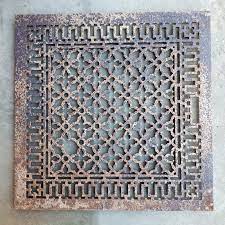 antique ornate cast iron floor or wall