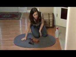 how to make a braided rug stay flat