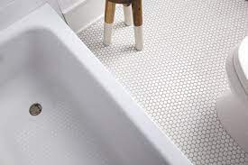 white penny bath floor tiles with light
