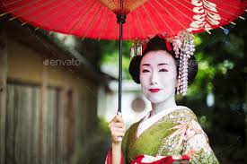 a woman in traditional geisha costume