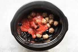 Shape the meatballs and place in slow cooker: Crockpot Meatballs With Grape Jelly Sauce Culinary Hill