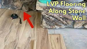 installing lvp flooring along a rough