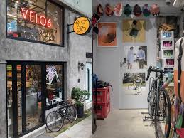 A man rides a bicycle through west kowloon cultural district on august 1, 2020. A Cycle Shop That Smells Like Coffee