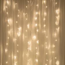 Amazon Com Merkury Innovations Curtain Lights Cascading Battery Operated Led Lighted Backdrop Curtain For Bedroom Wedding Decoration Or Christmas Warm White Home Improvement