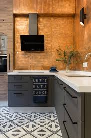The orange backsplash tiles, throw pillows, and rectangular stools coordinate the entire space. 75 Beautiful Kitchen With Orange Backsplash Pictures Ideas May 2021 Houzz
