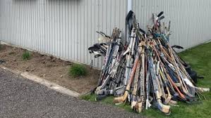 Hundreds Of Hockey Sticks Collected For