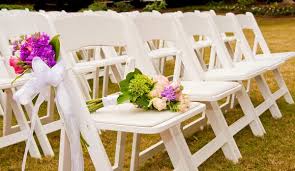 Folding Chairs At A Garden Wedding
