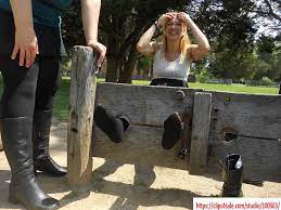 Awaiting tickling in the stocks in tights | A girl in shiny … | Flickr