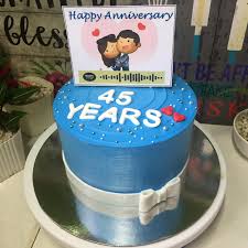 One of the biggest challenges i had when i started working with fondant was how to get a deep red, blue or black. Simple Blue Anniversary Cake And Caramel Baked With Love By Pia Facebook