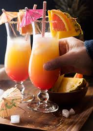 Any kind of tropical juice, definitely lime, coconut always if you've tried these pineapple and coconut rum drinks then don't forget to rate the recipe and let us. Coconut Orange And Pineapple Rum Punch Just A Little Bit Of Bacon