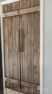 Your barn door will hang from a track or rail above the doorway. Double Pantry Barn Door Diy Under 90 Bifold Pantry Door Diy